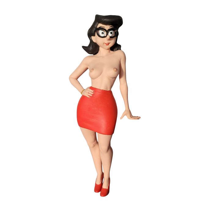 dans la serie les secretaires de la rédaction de gaston lagaffe voici Sonia qui pose topless et en jupe rouge sexy